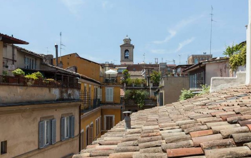Location de vacances - Appartement à Rome - Vue sur les toits dans la chambre