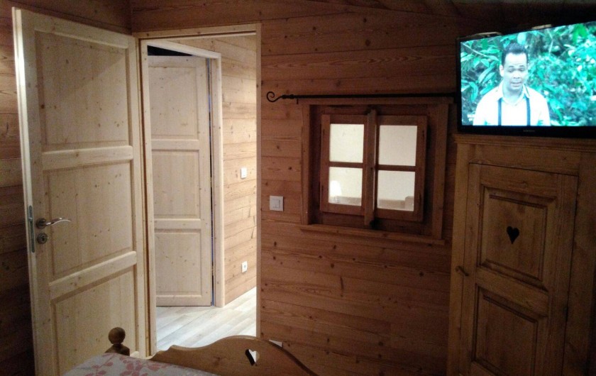 Location de vacances - Appartement à Le Corbier - vue depuis la chambre chalet du palier à l'étage