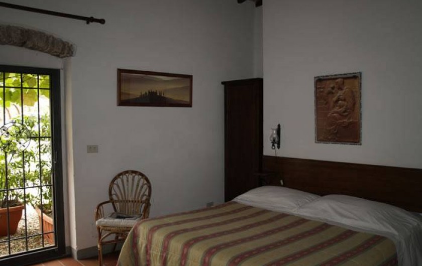Location de vacances - Appartement à San Jacopo Al Girone - Chambre de la location "Fienile all'Ombra"