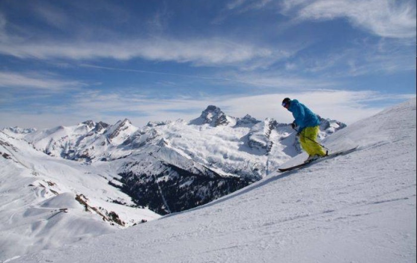 Location de vacances - Appartement à Le Grand-Bornand - une piste de ski alpin