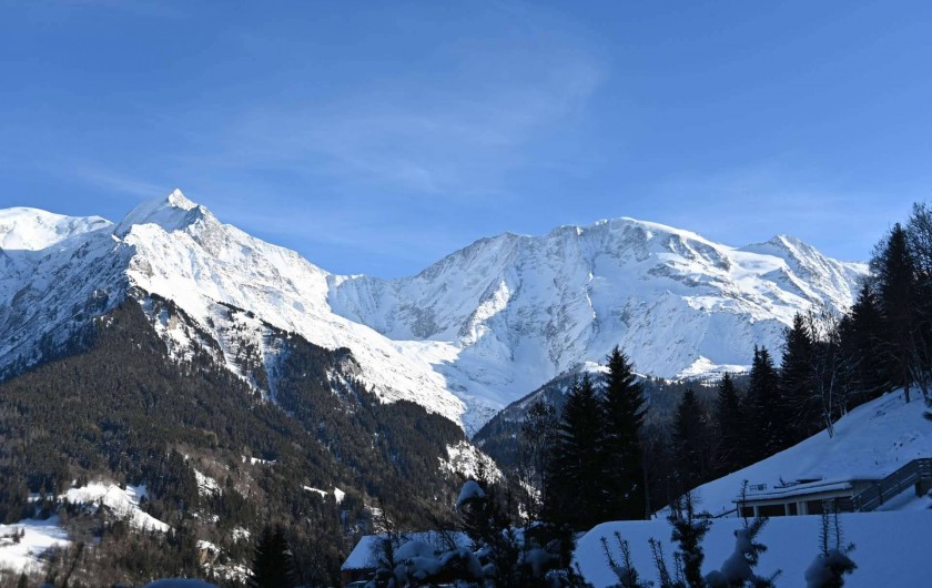 Location de vacances - Chalet à Saint-Nicolas de Véroce - La vus sur le massif du Mont Blanc depuis le balcon du séjour