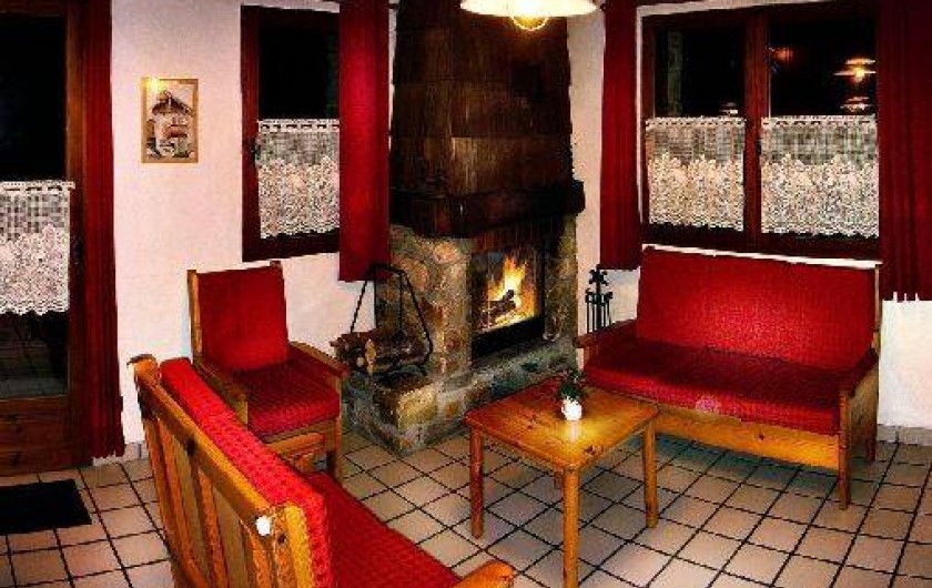 Location de vacances - Chalet à Champagny-en-Vanoise - coin salon avec cheminée