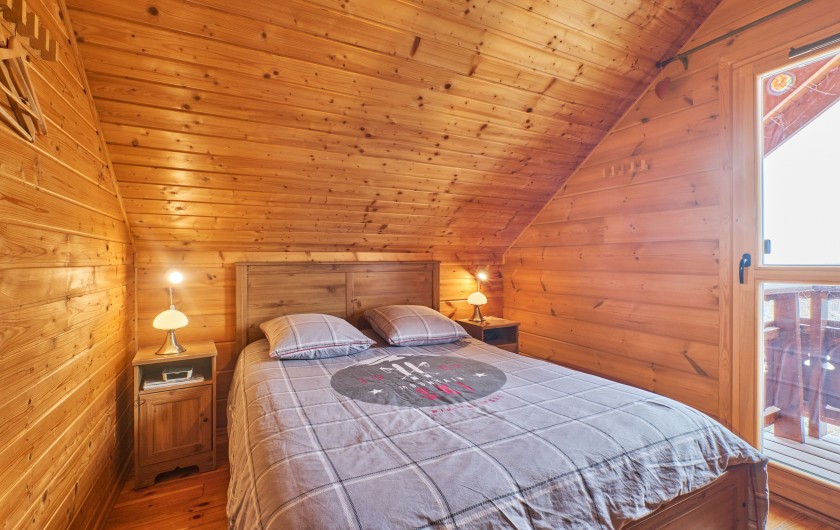 Location de vacances - Chalet à La Joue du Loup - Chambre avec lit double