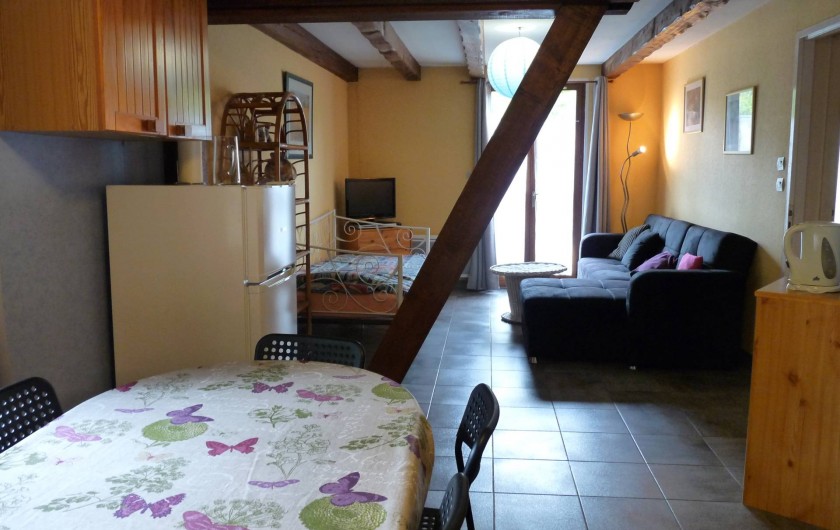 Location de vacances - Appartement à Ban-de-Laveline - coin repas et coin salon petit gîte