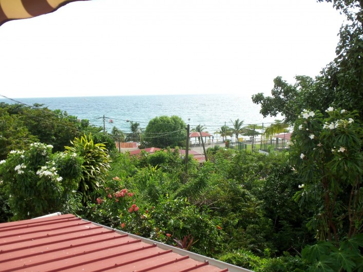 Location de vacances - Appartement à Les Anses-d'Arlet - Vue mer du balcon