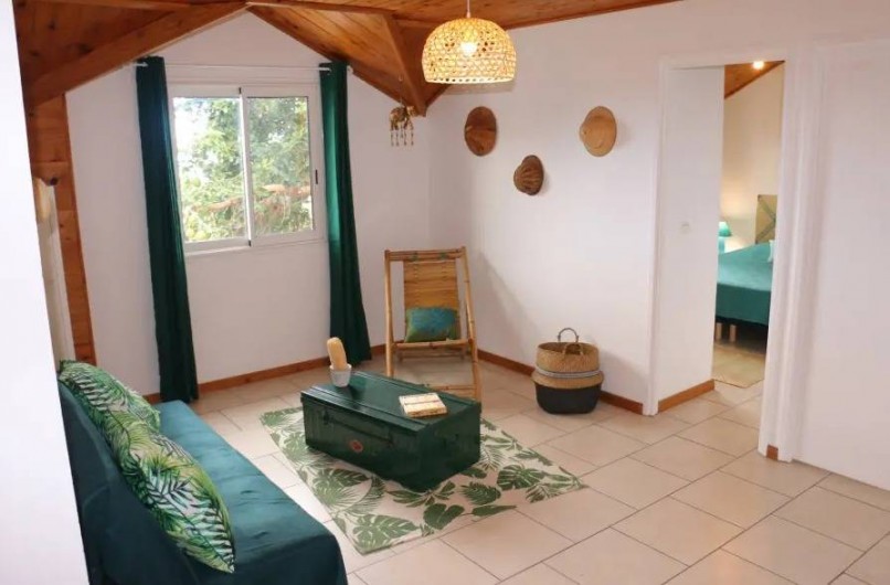 Location de vacances - Villa à L'Étang-Salé - Salon "Savanne" à l'étage , vue Océan Indien