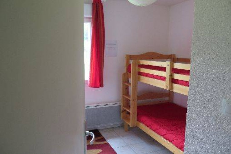 Location de vacances - Appartement à Gérardmer - Chambre avec lits superposés