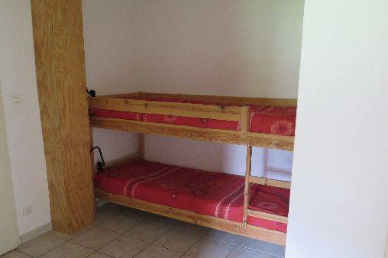 Location de vacances - Appartement à Gérardmer - Entrée avec lits superposés