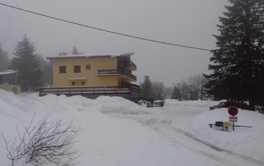 Location de vacances - Appartement à Orbey - vu depuis les pistes de ski