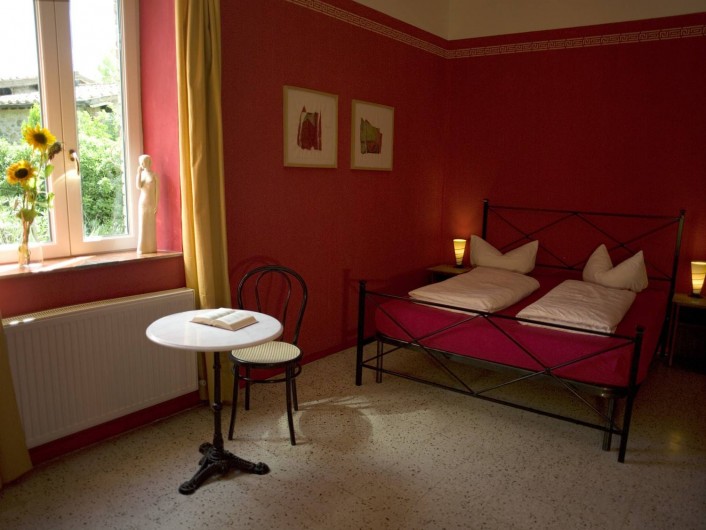 Location de vacances - Appartement à Castel Rigone - Chambre lit "Camera rossa" dans appt. "Il Peperino" La Rogaia