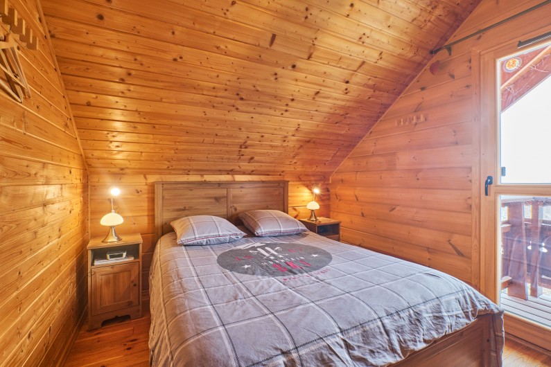 Location de vacances - Chalet à La Joue du Loup - Chambre avec lit double